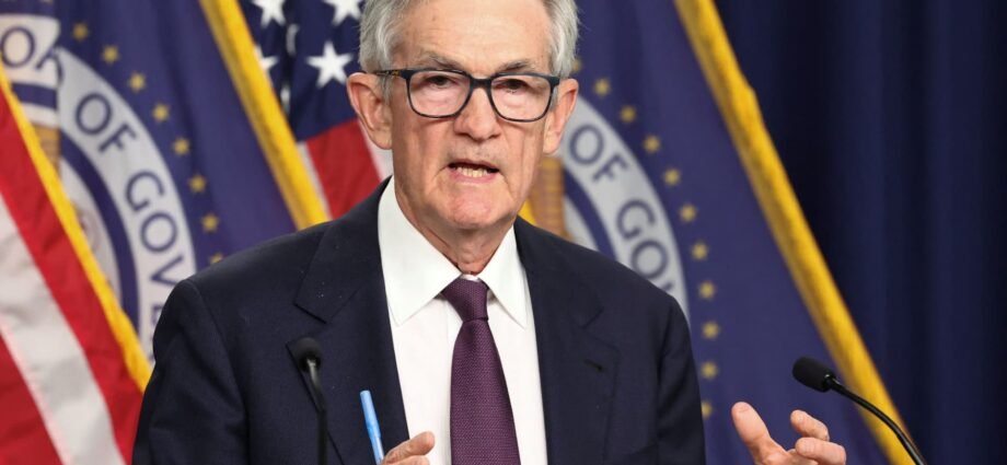 Fed leaves rates unchanged, defying Trump's demands for aggressive cuts