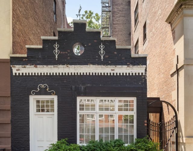 cropped tiny home surrounded skyscrapers heart 86033343