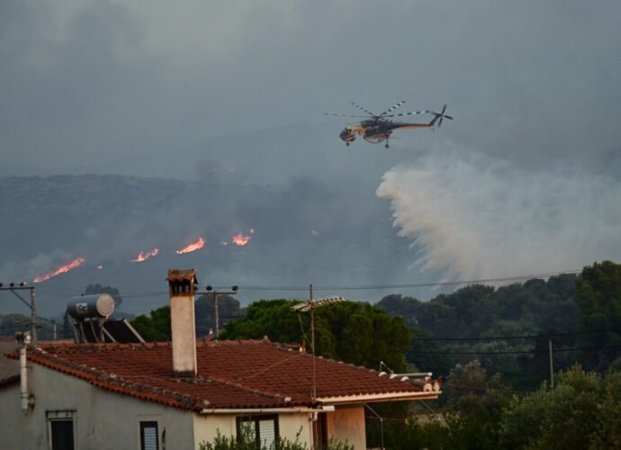 At least one killed as firefighters battle Greece blaze for second day | Climate News