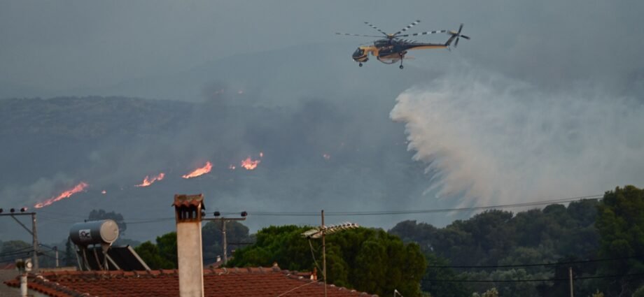 At least one killed as firefighters battle Greece blaze for second day | Climate News