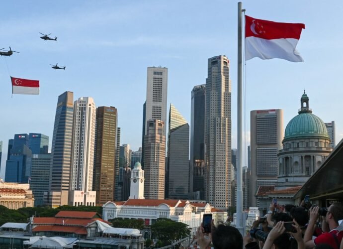 Singapore celebrates success on 60th anniversary but challenges loom ahead | Business and Economy News