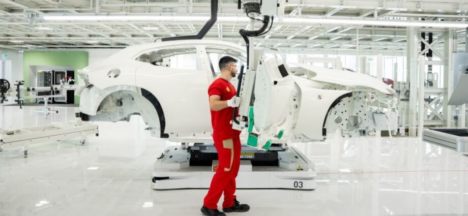 Ferrari unveils first electric vehicle and cuts 2030 EV sales target