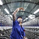 China factory activity edges up in November but remains in contraction