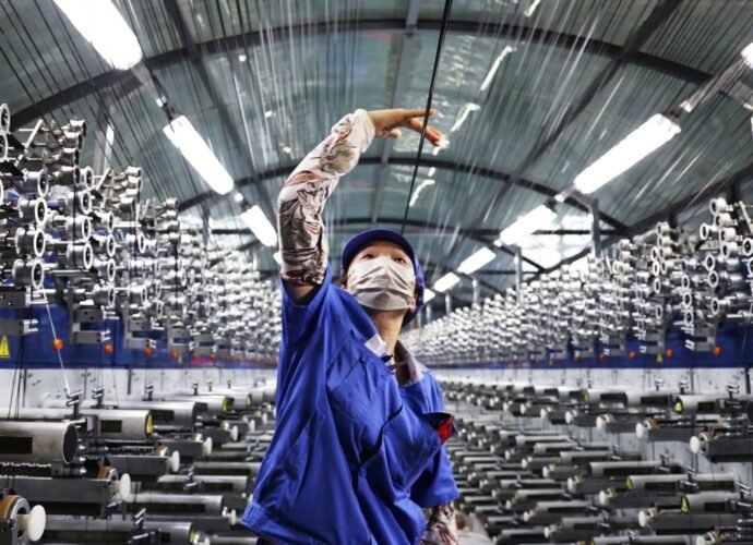 China factory activity edges up in November but remains in contraction