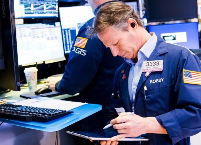 strong U.S. data; traders weigh Warsh Fed pick