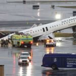 2 pilots killed when jet collides with fire truck at LaGuardia Airport