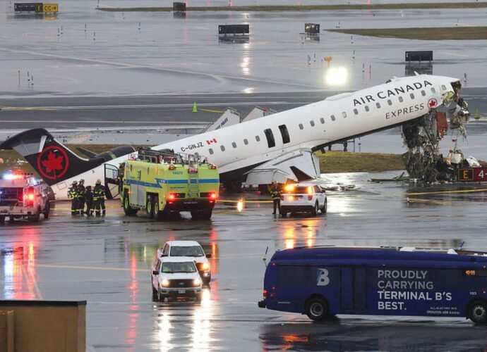 2 pilots killed when jet collides with fire truck at LaGuardia Airport