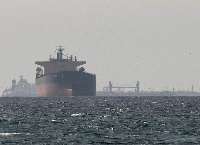 Iran says talks continue while it retains control of Strait of Hormuz