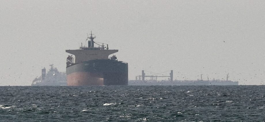 Iran says talks continue while it retains control of Strait of Hormuz