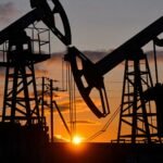 Oil tumbles more than 10% as Iran declares Strait of Hormuz open